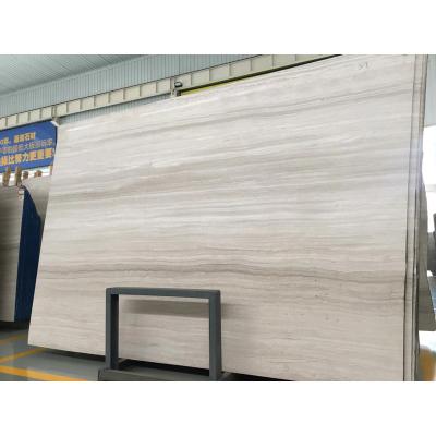 China Modern wood color marble slab floor tile, nature wood grain marble price, wood wall panel marble for sale