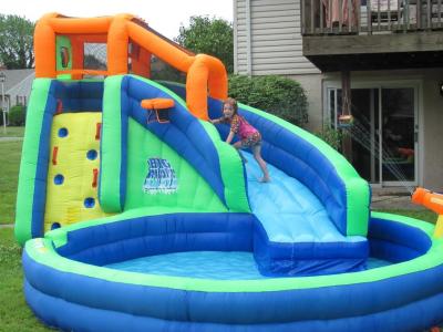 China Commercial Grade Inflatable Backyard Water Slide Double Stitching for sale