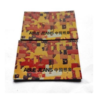 중국 Garment Accessories Leather Clothing Labels Printed Embossed Private T Shirt Label 판매용