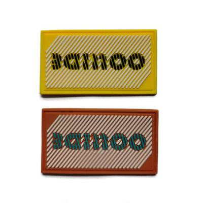 China Apparel PVC Rubber Label Badge Durable Custom Soft 3D Soft Silicon Te koop