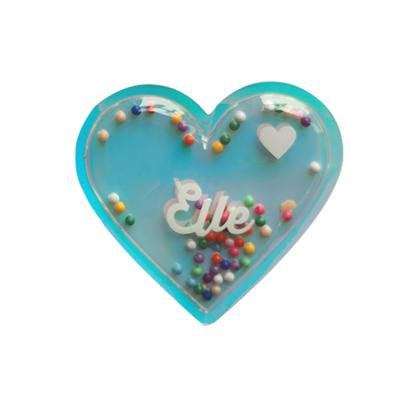 China Metal Label Rubber Badge Cute Heart Nickel Free Shape For Garment à venda