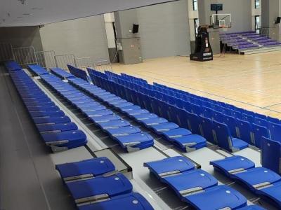 China Manual or Power Operation Retractable Bleacher Seating with High Grade HDPE Seat and Optional Handrail for sale