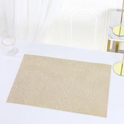 China Viable Rectangular Explosive Dining Table Mats Insulation Pads Decorative Placemat PVC Yarn Placemat Gold For Home for sale