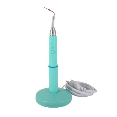 China Dentist Associate Factory Direct Top Working Medical Cheap Dental Filling Pen Gutta Cutter Green 110V/220V With Free 2 Tips for sale