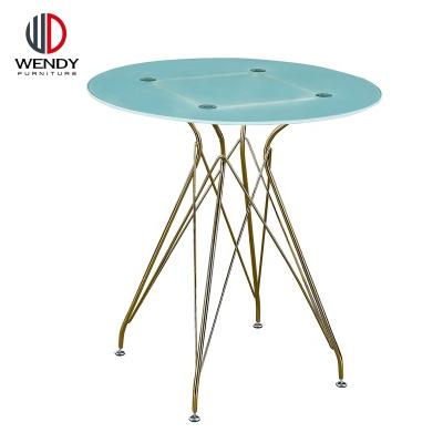 China Modern popular tempered glass top and chromed gold dining table for sale