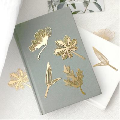 China China Personalized Leaf Metal Bookmark As Gift Exquisite Brass Clover Bookmarks With Tassel For Books for sale