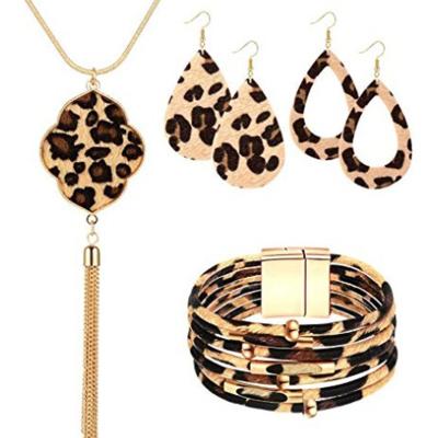 China FASHIONABLE Leopard Fringe Earrings Bracelet Necklace Jewelry Set For Women Explosion Four Leaf Clover Design Sweater Chain Necklace for sale