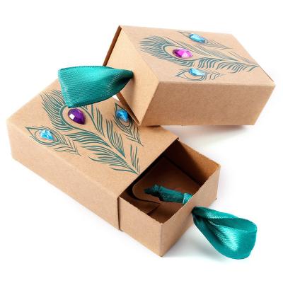 China 50Pcs/lot Recyclable Peacock Feather Candy Boxes Wedding Favors Faux Wrapping Paper Gift Boxes 7.5x5x3cm for sale