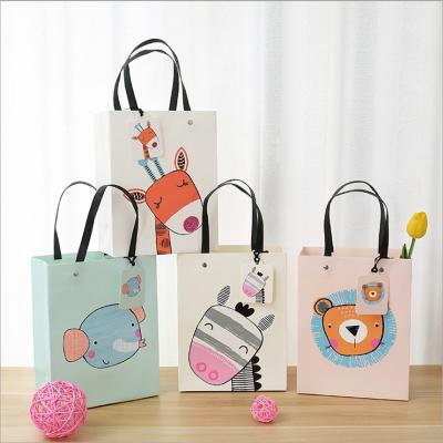 China Recycled Materials 10pc/lot Cartoon Gift Bag Portable Paper Bag Thickened Birthday Gift Paper Bag for sale