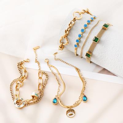 China Romantic Hengyu Original 2023 Stainless Steel Fashion Jewelry Women Gold Plated Paper Clip Chain CZ Blue Eye Bracelet Femme Wholesale for sale