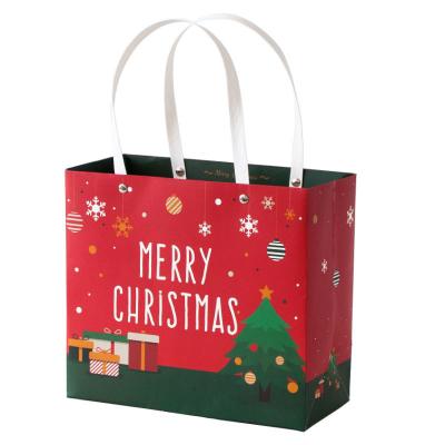 China Recycled Materials Christmas Tree Paper Bag Packaging Rivet Scarf Gloves Gift Bag Holiday Business Portable Greeting Cards For New Year Gift Set for sale