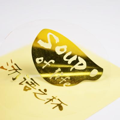 China Transparent Gold Stamping Sticker Label Waterproof PVC Custom Label Stickers Logo Adhesive Labels Printing for sale