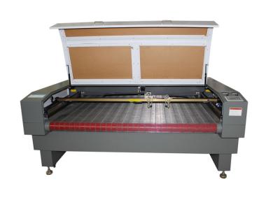 China Double head auto feeding fabric laser cutting machine , Fabric Laser cutter for sale