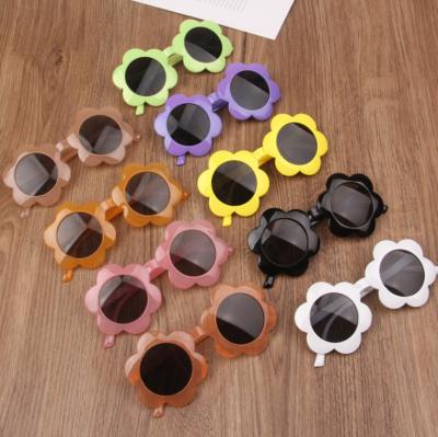 China Fashion Sunglasses New Flower Shape Latest Fashion Kids Sunglasses For Little Girls for sale