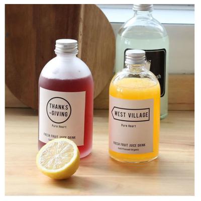 China 150ml 250ml 350ml 500ml Empty Round Beverage Beverage Kombucha Glass Bottles For Juice With Aluminum Cap for sale