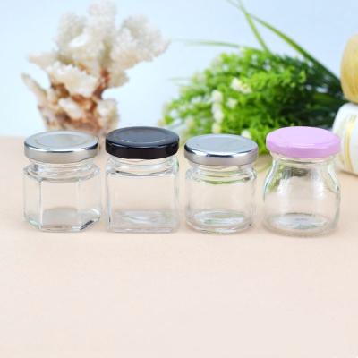 China Kitchen storage 500ml caviar glass jars with screw tin lid for kichen storage for sale