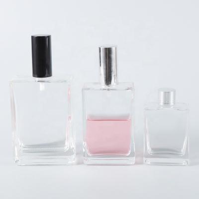 China For Cosmetic Use 30ml 50ml 100ml Flat Square Glass Perfume Bottle With Stainless Steel Caps for sale