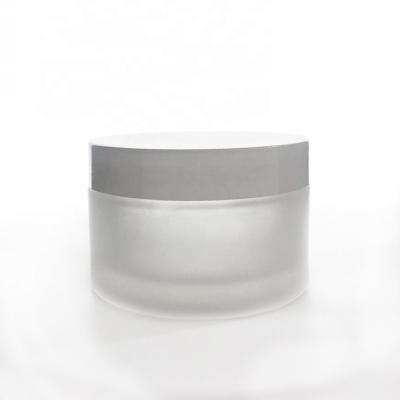 China For Cosmetic Use 200ml Matt Glass Cosmetic Container For Cream And Lotion With White And Black Caps for sale