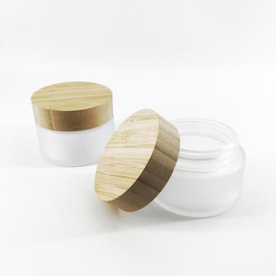 China For Cosmetic Use 2oz 4oz Bamboo Cosmetic Empty Cream Jar With Wooden Caps for sale