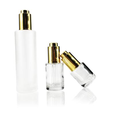 China For Use Cosmetic Push Button Shoulder Essential Oil Serum Flat Bottle Customize Frosted Cosmetic Glass Dropper Bottle for sale