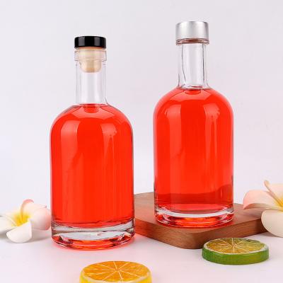 China Beverage 750ml Clear Empty Round Gin Liquor Wine Vodka Alkohol Glass Wine Bottle With Screw Top for sale