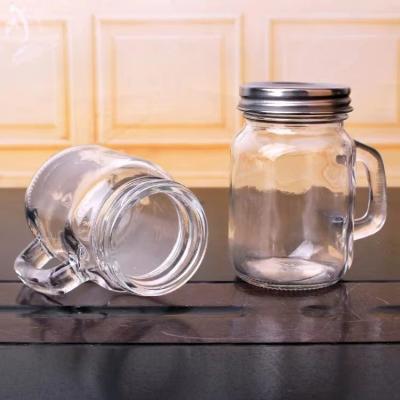 China Hot Freshness Keeping Spun 120ml Clear Glass Mason Storage Jar With Handle And Metal Lid for sale