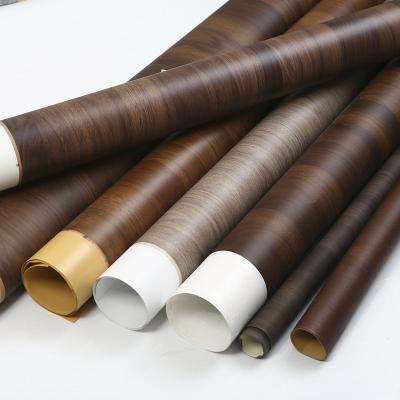 China Fios laminados de grãos de madeira cinza-negro auto-aderente para móveis à venda