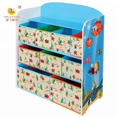 China Kid's Sustainable Toy Storage Shelf Toy Organizer Wooden Shelf With Cloth Bins for sale