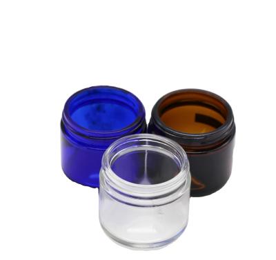 China Personal Care In Stock Clear 50g 60g Straight Sided Round Glass Cream Jar Candle Jar With Metal Lid ABS Cap for sale