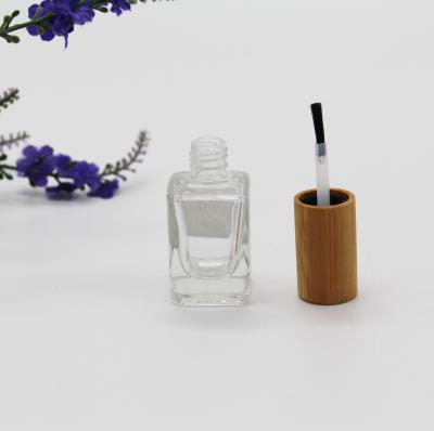 China Non Spill Wholesale Bamboo Wood Cosmetic Nail Polish Bottle Glass Cap for sale