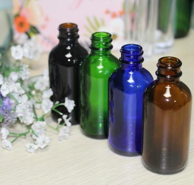 China Empty Clear Green Amber Glass Dropper Bottle Essential Oil Boston Round Bottle Cobalt Blue Personal Care 1oz 2oz With Dropper for sale