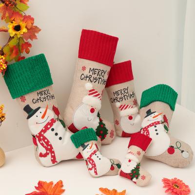 China New Christmas Snowman Embroidery Old Man Snowman Decorative Canvas Christmas Socks Fluffy Christmas Canvas Gift Bags Gift Bags for sale