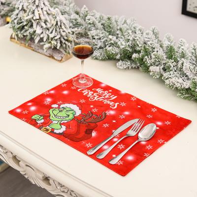 China Stored Creative New Christmas Decoration Atmosphere Table Printing Santa Place Mat Heat Insulation Pad for sale