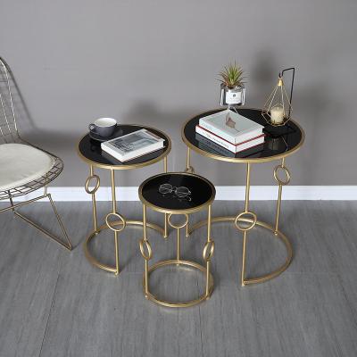 China Nordic modern simple living room coffee table small apartment tea sofa coffee table art iron geometric round table for sale