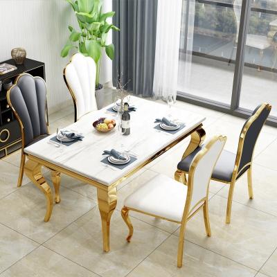 China Modern Rush Design Metal Steel Frame Faux Marble Best Selling Dining Table for sale