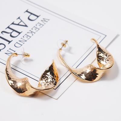 China 2021 TRENDY European and American spiral embossed retro simple rotating INS jewelry fashion earrings for sale