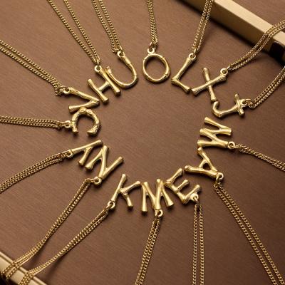 China TRENDY 14K 18K Yellow Gold Bamboo Shape 26 Stainless Steel Letter Necklace Pendants for sale