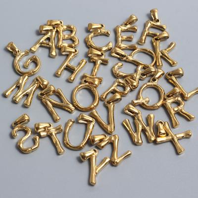 China TRENDY Custom 26 Alphabet 0.3 Micron 14K 18K Gold Plated Pendants Stainless Steel Letter Pendant for sale