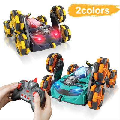 China RC Hobby 2.4G Six Wheel Stunt Vehicle Remote Control Omnidirectional Drift Stunts Boy With Light Throw Toy Car for sale