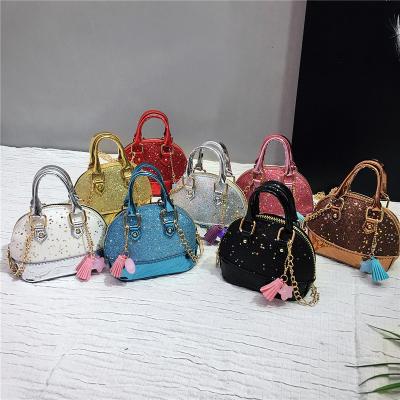 China SP1038 latest fashion fashion cross - SHELL-shape glitter kids handbag girls body tassel kids mini purse handbags 2021 for sale