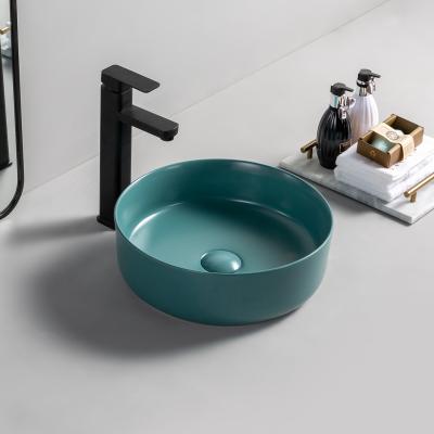 China Modern Popular Hot Sale Countertops Round Matte Ceramic Hotel Bathroom Hand Wash Art Basin for sale