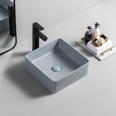 China Popular Modern European Style Matte Square Porcelain Modern Table Top Washroom Sink for sale