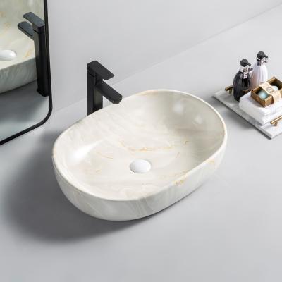 China Modern Hot Sale Style Hand Selling Style Bathroom Wash Basin Water Transfer Printing Ceramic Top Basin for sale