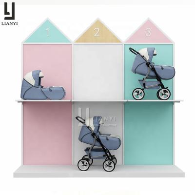 China Kids Shop Baby Store Display Infant Furniture Wooden Wall Pram Display Stand Stroller Display for sale