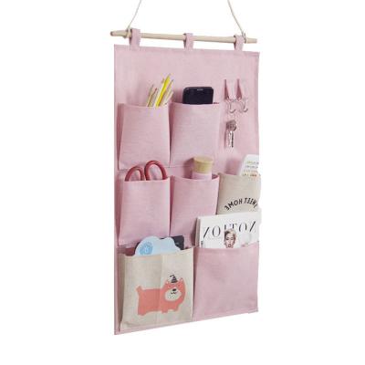 China Hot Selling Cotton Folding And Wall Canvas Shelf Bags Hanging Storage Bag Organizer With Waterproof PE Layer for sale