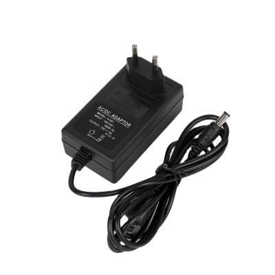 China High Quality ABS+PC Universal Input AC 220V To DC 0.5A 1A 2A Power Adapter 5V 9V 12V 15V 18V 24V for sale