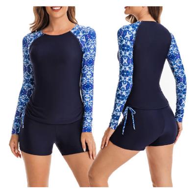 China OEM Surfsuit Two Pieces Women's Long Sleeve Swimsuit Printed Compression Wear Sexy Girls Swimwear Rash Guard for sale