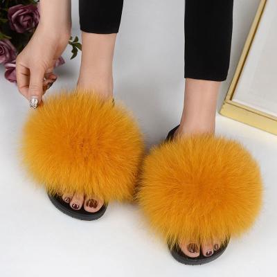 China Fashion Trend Custom Multicolor Fur Slippers Smudge Fluffy Raccoon Slide Sandals Large Slides For Women for sale