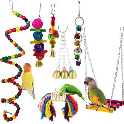 China 7 Piece Viable Bird Parrot Swing Hanging Toys Bell Natural Wooden Birdcage Toys for sale