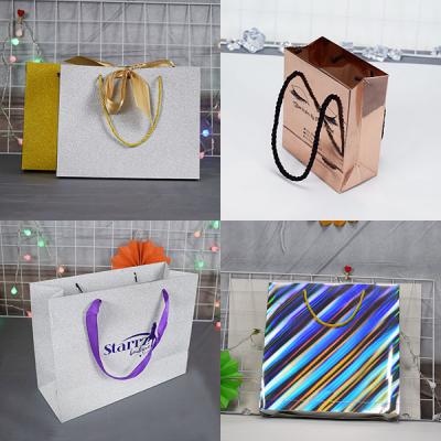 China Recycled Materials Glitter Shopping Custom Paper Bags With Your Own Logo for sale